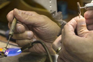 jewelry making process with hands